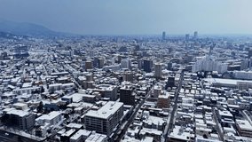 Aerial photography of street scene after snow in Sapporo, Hokkaido, Japan - Powered by Shutterstock - Get 15% off with code: PIKWIZARD15