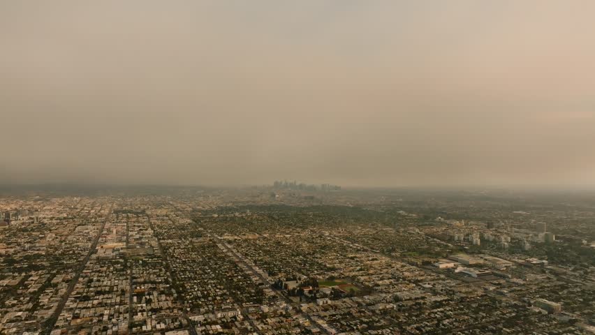 4K aerial of the LA fires in January 2025 from West Hollywood, Los Angeles, California, USA.