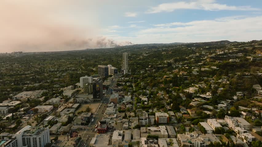4K aerial of the LA fires in January 2025 from West Hollywood, Los Angeles, California, USA.
