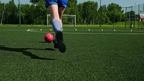 Small Footballer Sprinting With Ball On A Green Pitch During Training - Powered by Shutterstock - Get 15% off with code: PIKWIZARD15
