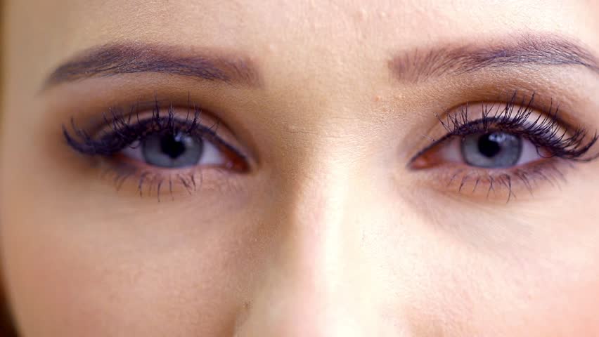 Close up on Eyes of Sexy Lady in Slow Motion
