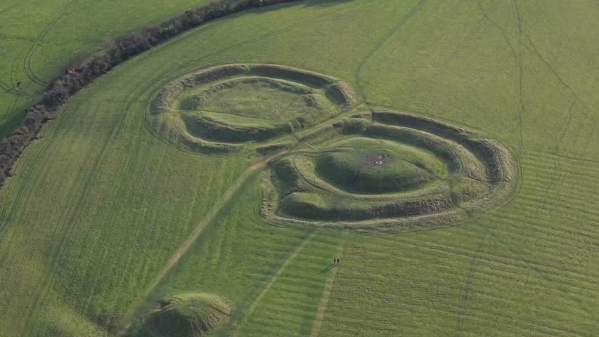 Mound of Hostages And Lia Fail (Stone of Destiny) At The Hill Of Tara In County Meath, Ireland. - aerial shot
