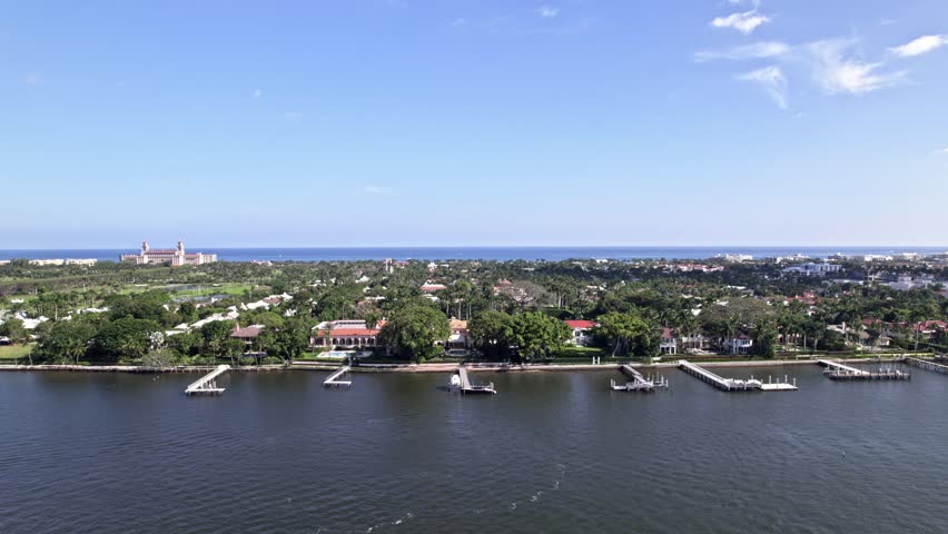 Push in drone shot of West Palm Beach residential area in the day in Florida, USA