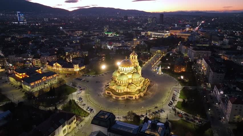 Night aerial view of the capital of Bulgaria, Sofia. Architectural and emblematic buildings from the communist era in the city center. Council of Ministers, Presidency and Party House. Sunset, sunrise