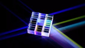 Crystal cube prism with refraction and holographic effect on dark background, close view - Powered by Shutterstock - Get 15% off with code: PIKWIZARD15