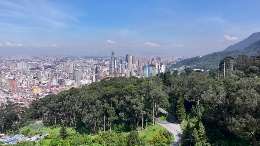 Bogota Skyline At Bogota Cundinamarca Colombia. Birds Eye View Of Stunning Cityscape With Streets And Buildings. Town Clouds Sky Backgrounds Urban. Town Up Above. Bogota Cundinamarca.