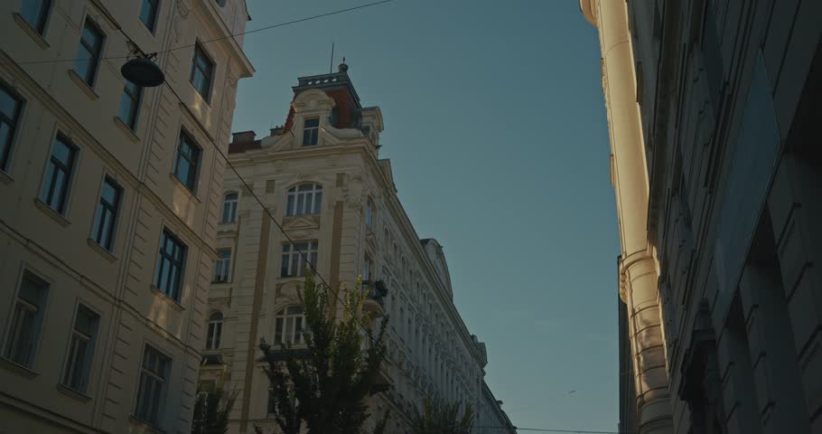 Elegant historic buildings under clear skies in Vienna, Austria