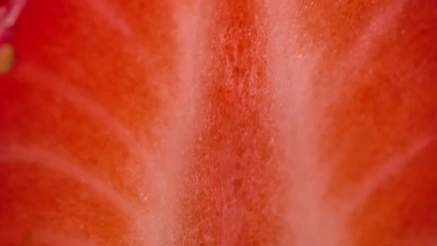 Ripe strawberries macro view. The texture of fresh strawberry. Fruit background.