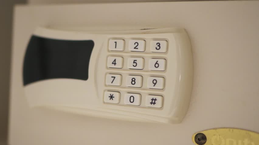 Close-up of digital safe keypad with numeric buttons for added personal security.