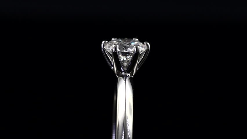 beautiful bright and shine rotating solitaire diamond ring. solitaire diamond ring