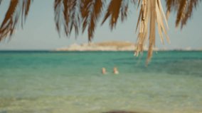 Sand blurred tropical beach blue sky bokeh background summer. Wave water splash pattern shore sunshine. Text Space area. - Powered by Shutterstock - Get 15% off with code: PIKWIZARD15