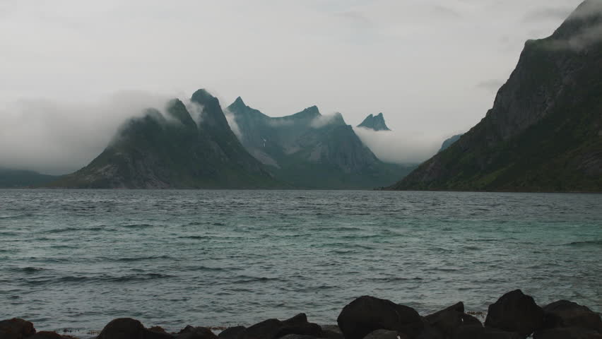 Misty fjord landscape in Lofoten Norway at Reine