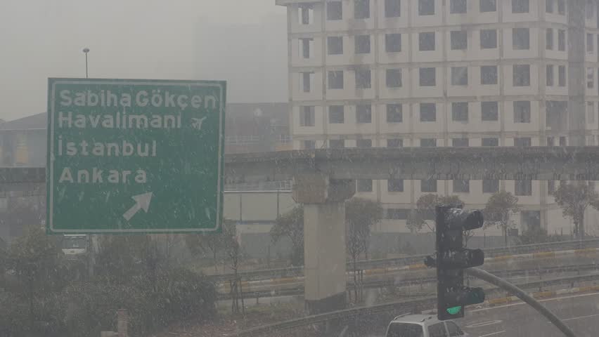 Heavy snowfall and traffic in Istanbul. horizontal video. HD. 4K. overcast sky. newest