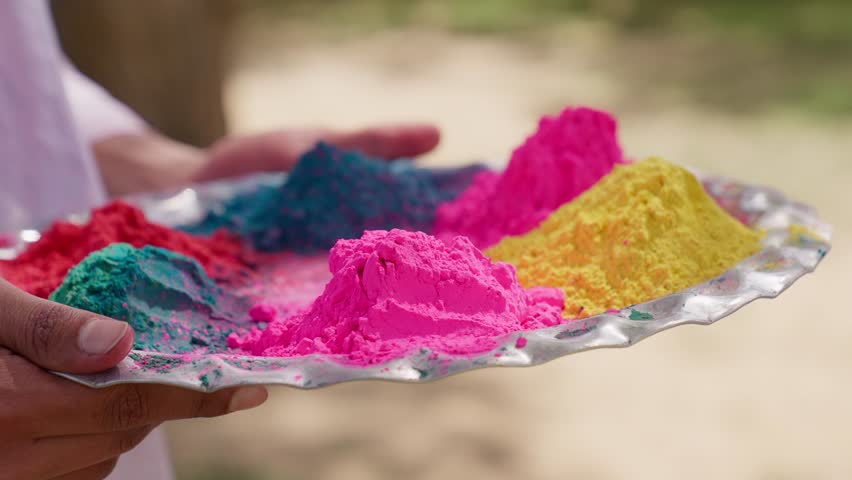 Closeup of Indian Woman Picking Holi Color From Thali