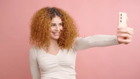 Influencer posing for social media content on pink background - Powered by Shutterstock - Get 15% off with code: PIKWIZARD15