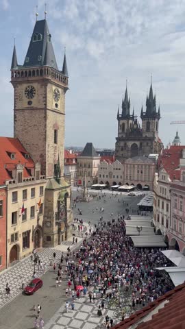 Old clock in Prague. People watching at old clock.