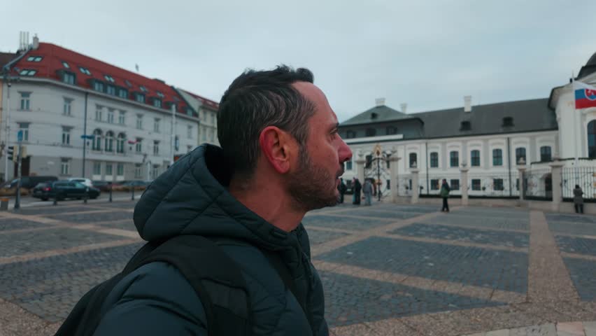 Tourist Man walking around the Bratislava Old Town in Slovakia