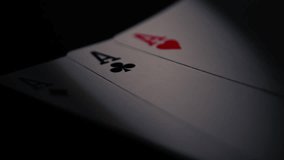 Poker player holding aces playing cards close up zoom shot selective focus - Powered by Shutterstock - Get 15% off with code: PIKWIZARD15