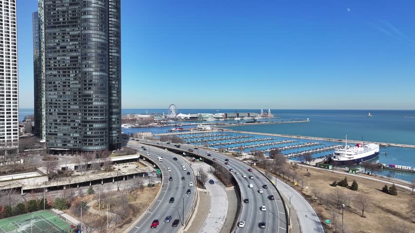 Navy Pier At Chicago Illinois United States. Turquoise Ocean Waves Gently Crashing On Tropical Beach. Business Sky Background Downtown Cityscape. Business Famous. Chicago Illinois.