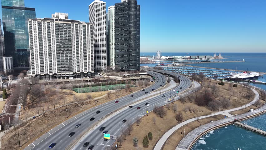 Navy Pier At Chicago Illinois United States. Highway Interchange Crossing City With Traffic Jam. Business Sky Background Downtown Cityscape. Drone View Downtown Famous. Chicago Illinois.