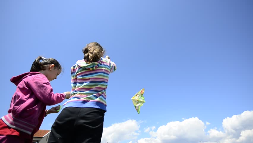 kid girls with kite, wide angle