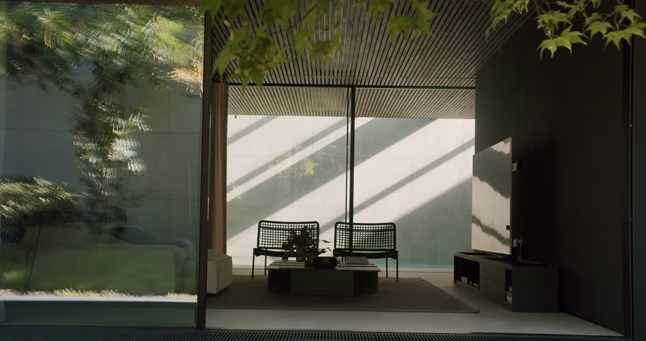 A serene modern home patio featuring stylish furniture, understated decor, and soothing natural light. Elegant Modern Home Patio with Natural Light and Stylish Furniture