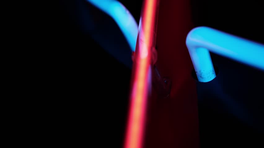 Colorful Illuminated Neon Tubes On Black And Colorful, close up view
