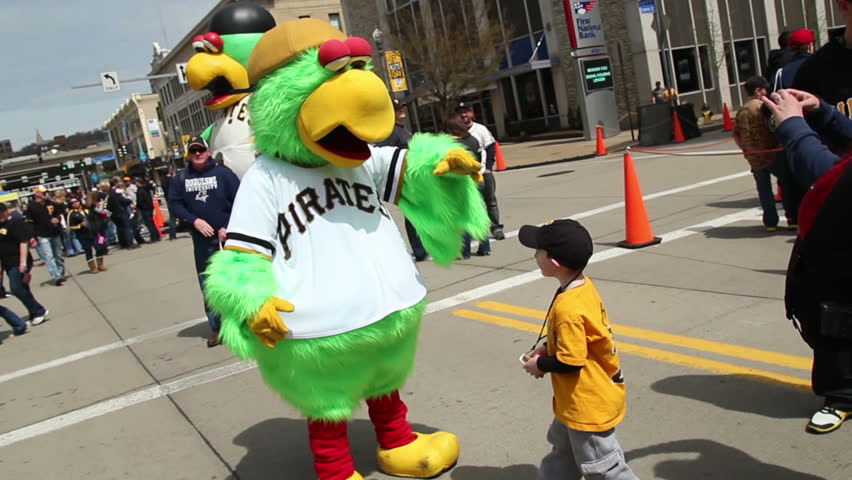 PITTSBURGH, PA - CIRCA APRIL 2013: Children pose with the Pirate Parrot outside