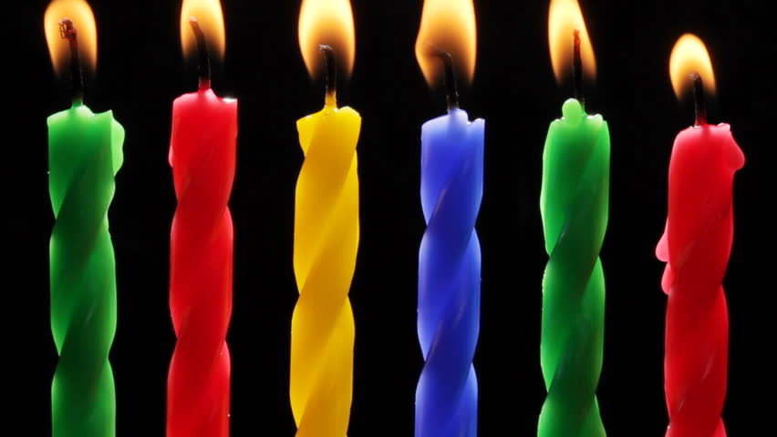 Time lapse birthday candles burning and being blown out