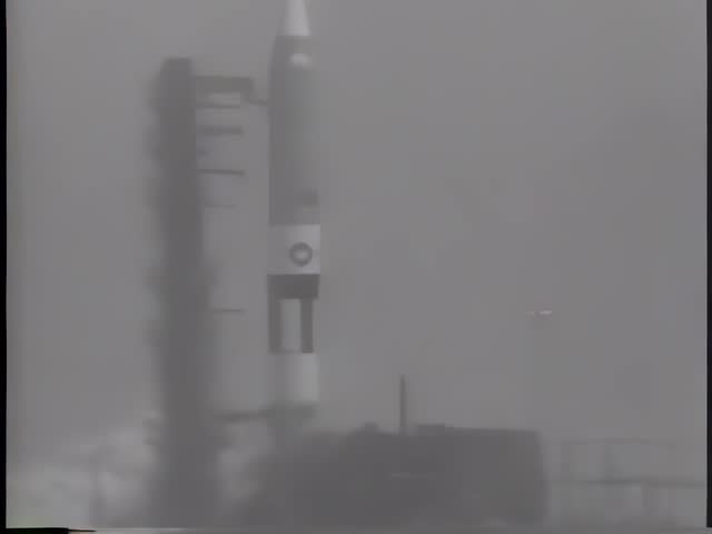 Vintage footage of a rocket launch with smoke billowing. Missile in flight. Missile launching to space footage. Execute missile airborne earth surface to the air.