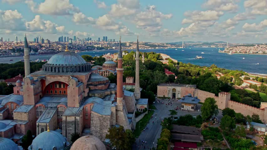 An aerial view of Istanbul historic peninsula, featuring Hagia Sophia, famous museums,lush gardens and the Bosphorus The city's skyline and highlight its rich cultural and historical heritage.