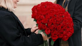 Elderly woman and man meeting together on Valentines day, man presenting bouquet of red roses - Powered by Shutterstock - Get 15% off with code: PIKWIZARD15