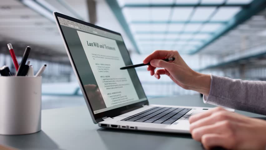 Close-up Of A Person Writing Last Will And Testament