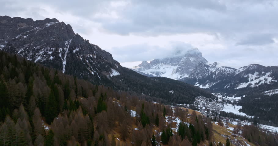 Aerial drone view of snow on the mountains in the Dolomites, Italy