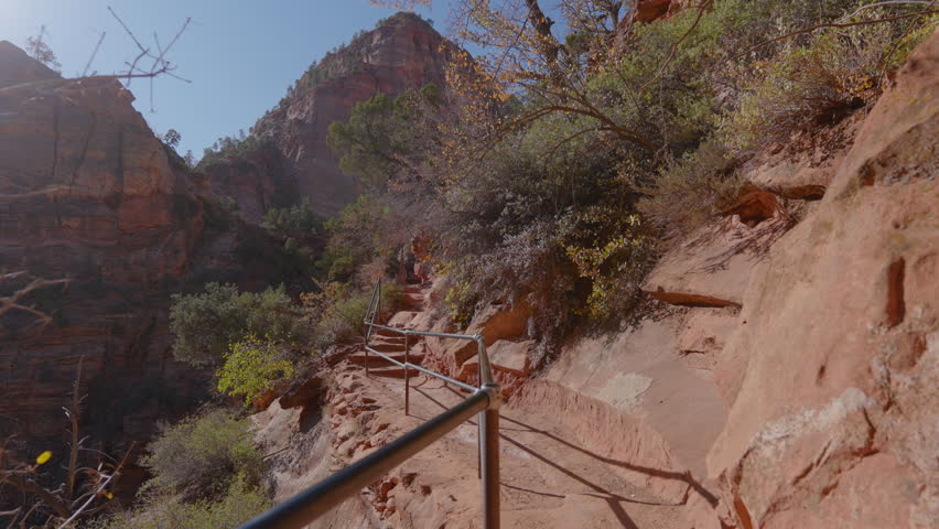 Discover the breathtaking trails and stunning landscapes of Zion National Park, a true gem for adventurous travelers who are seeking to explore nature and escape the ordinary world around them