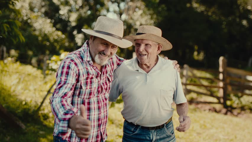 Two Brazilian Farmers Embracing and Smiling at the Camera – Premium Cinematic 4K
