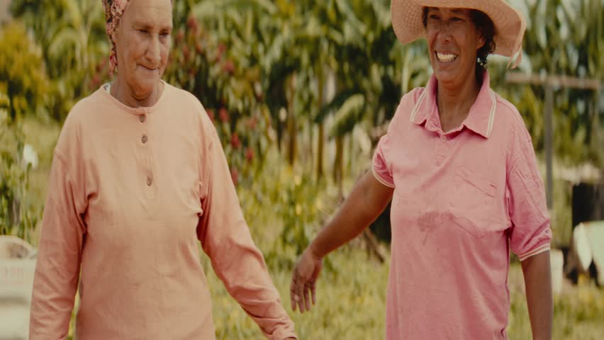 Elderly Brazilian Woman Embracing Her Daughter, Looking at the Camera – Cinematic Anamorphic 4K | ARRI Alexa | Cinemascope