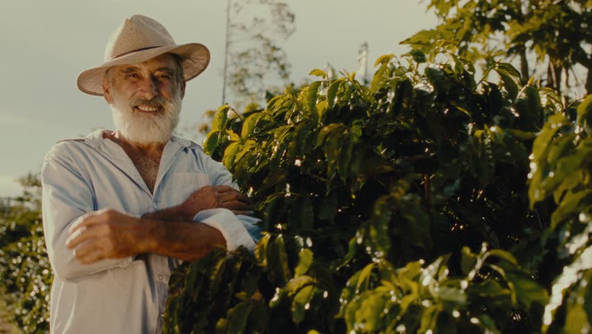 Resilient Brazilian Farmer: Middle-Aged Man Smiling Confidently with Arms Crossed. Cinematic 4K