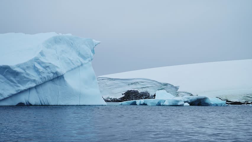 Antarctica Scenery of Icebergs and Ice on Antarctic Peninsula in Vast Dramatic Landscape, Beautiful Seascape with Big Unusual Shapes in Blue Winter Coastal Scene