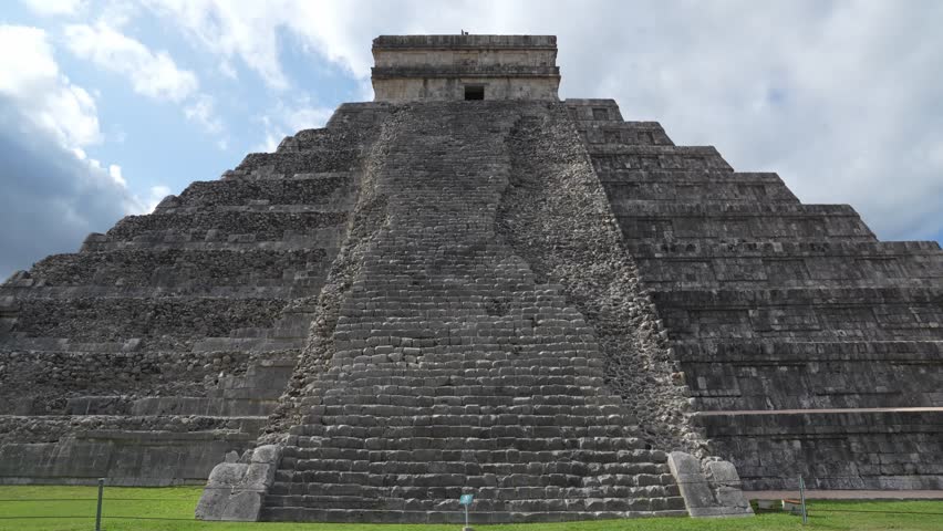 The front view of El Castillo, an ancient Mayan pyramid in Chichen Itza, Mexico.