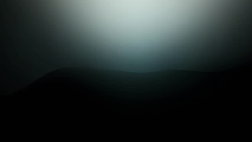 Endless loop video of ethereal light beam in dark ocean depths creating mysterious underwater atmosphere and serene environment with soft gradients of blue and black