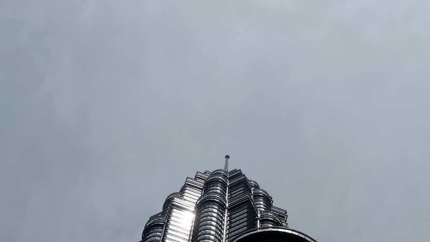 KUALA LUMPUR, MALAYSIA - OCTOBER 20, 2024 : view of Saloma Link, a landmark bridge that connect Kuala Lumpur city centre and Kampung Bharu, a cultural local attraction in Malaysia