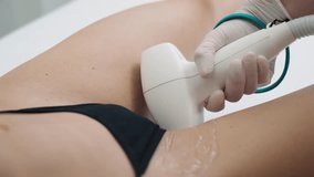 Depilation in the bikini zone of a girl in cosmetology. Beauty and health of a woman, procedures at a cosmetologist, epilation. High quality 4k footage - Powered by Shutterstock - Get 15% off with code: PIKWIZARD15