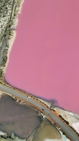 An aerial view of the scenic Hutt Lagoon in Gregory town in the Mid West region of Western Australia, Australia, on a sunny day