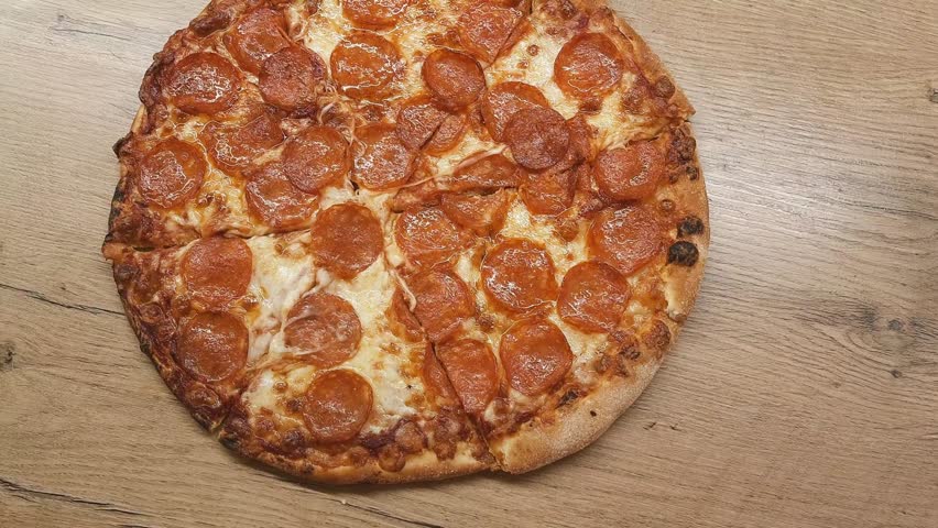 man hand taking slice of pizza with cheese, tomatoes from food delivery.