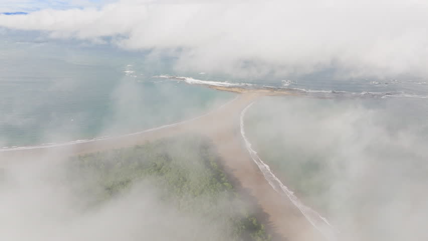 Breathtaking aerial perspective of Punta Uvita that highlights the incredible beauty and natural splendor of Marino Ballena National Park in Costa Rica