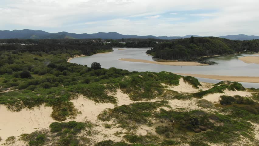 Bonville Creek and beach, Sawtell in northern New South Wales, Australia. Aerial drone pov