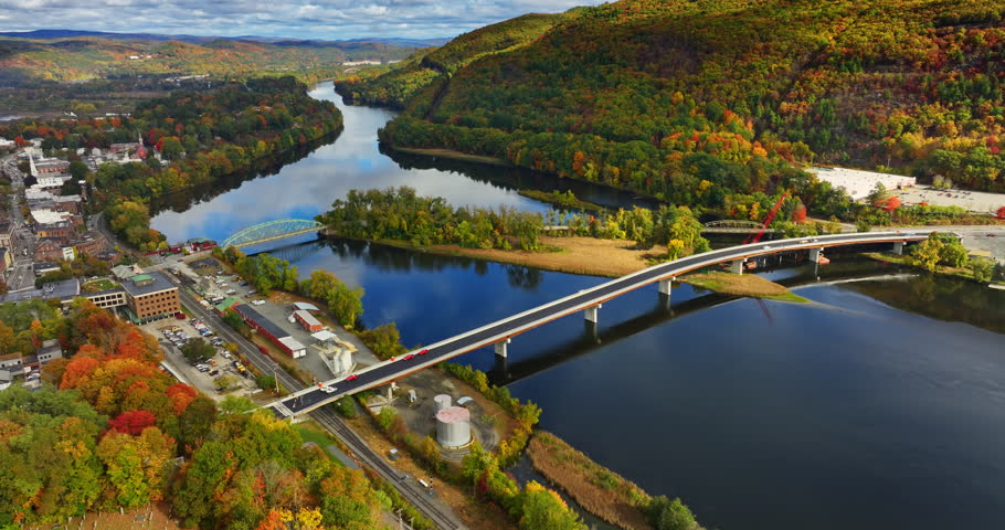 Bridges over the Connecticut river in Brattleboro, Vermont, New England, USA. Aerial perspective on the beautiful town in autumn.