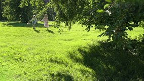 Children joyfully participate in an Easter egg hunt in a sunny park. They gather colorful eggs into a wicker basket and walk barefoot on lush grass, enjoying a cheerful spring celebration. - Powered by Shutterstock - Get 15% off with code: PIKWIZARD15