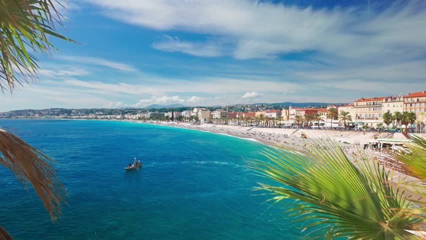 Beautiful view of Nice, Cote d'Azur, France. Cityscape of Nice on a sunny summer day on luxurious French Riviera. Top view revealing footage of the iconic Baie des Anges and the Mediterranean Sea